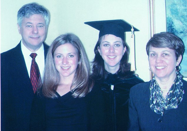Mike Brown, together with his daughters, Sara and Elizabeth, and his wif...