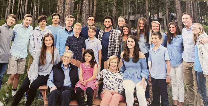 Bill and Peggy Sly with their grandchildren.