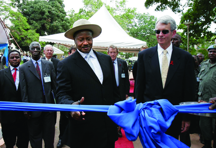 Nelson Sewankambo and Hank McKinnell at the ribbon-cutting ceremony for ...